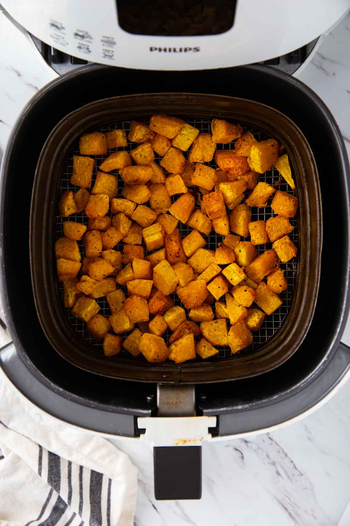Cubed butternut squash roasted in the Air Fryer.