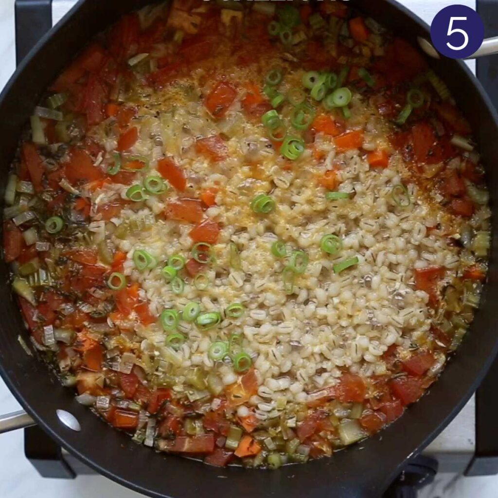 Cooled vegetable barley soup in a large pot.